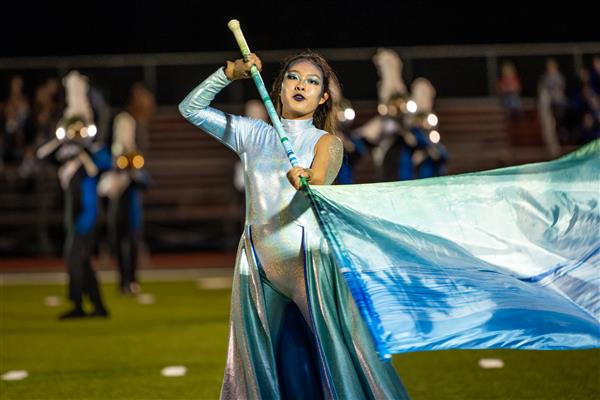 Brentwood High color guard member performs on the field